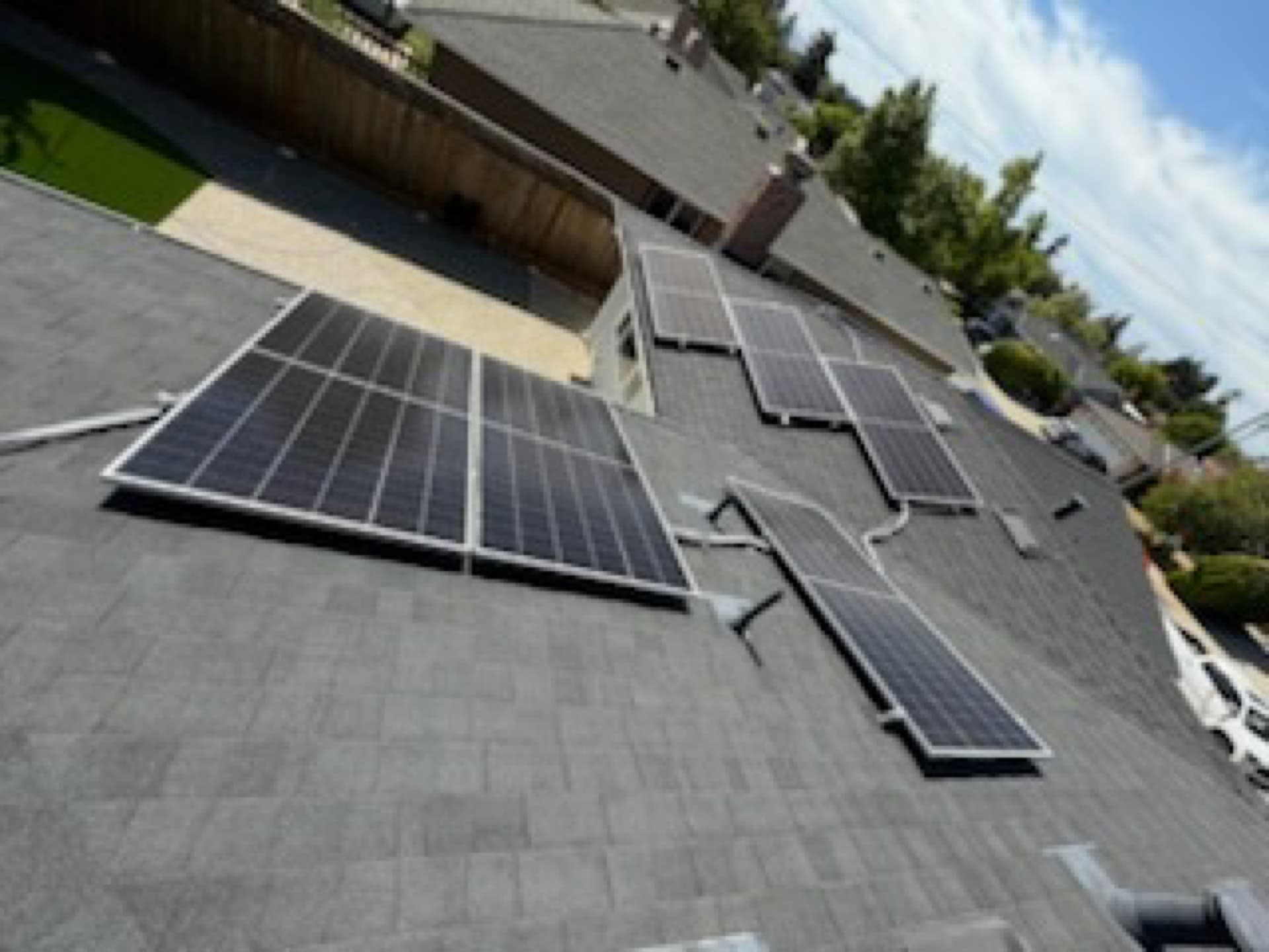 Rooftop solar panel array installed on a residential roof by Astral Electrical, licensed C-10 #1114918.